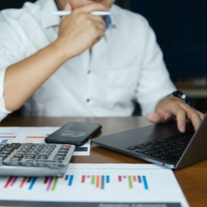 business-people-working-on-desk-with-paper-graph-a-2023-11-27-05-28-31-utc business-people-working-on-desk-with-paper-graph-a-2023-11-27-05-28-31-utc